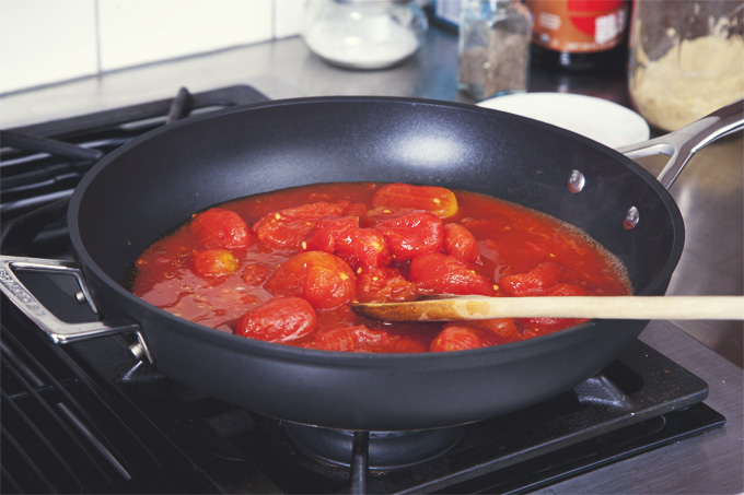 AWESOME Marinara Sauce in just 20 minutes! Use whole peeled tomatoes for a classic marinara, or diced tomatoes for a chunky sauce. | picklesnhoney.com #marinara #sauce #tomato #spaghetti #vegan #glutenfree #sugarfree #recipe #italian