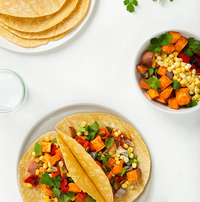 Sweet Potato Tacos with Grilled Corn & Roasted Red Pepper | picklesnhoney.com #vegan #glutenfree #recipe #tacos #cincodemayo