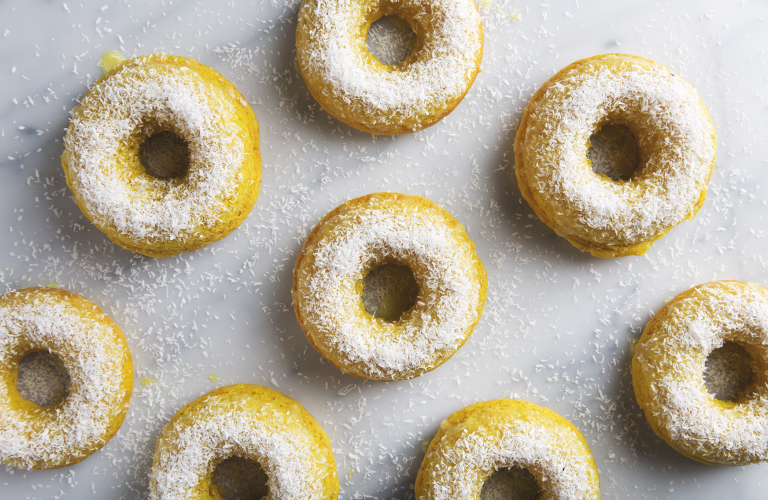 Turmeric Lemon Coconut Donuts | picklesnhoney.com #donuts #coconut #turmeric #lemon #dessert