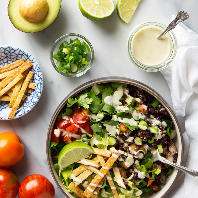 Quinoa Taco Salad with Garlicky Cashew Cream Dressing | picklesnhoney.com #vegan #quinoa #taco #salad #lunch #dinner