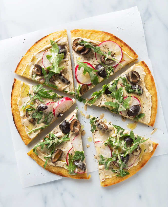 Simple Spring Socca Pizza (Vegan & GF) Only 8 ingredients + 25 minutes to make! | picklesnhoney.com #socca #pizza #vegan #glutenfree #recipe