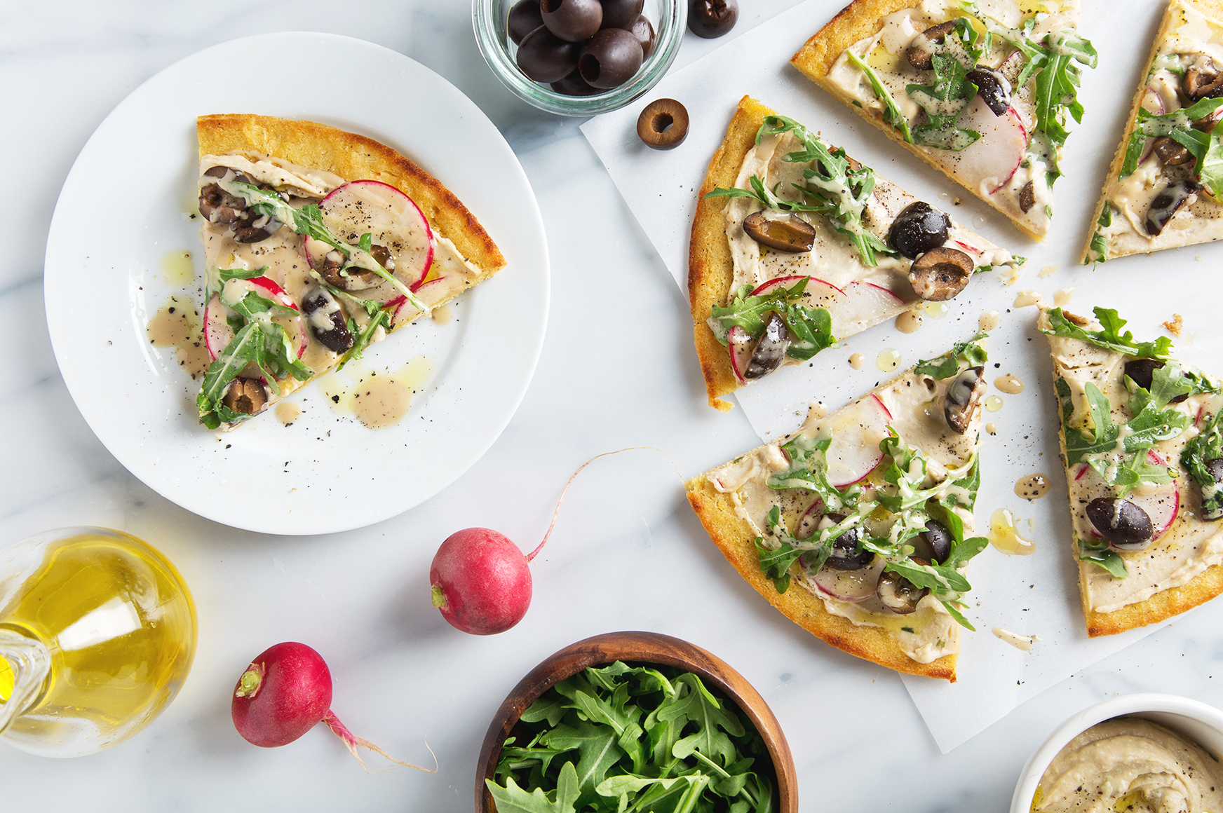 Simple Spring Socca Pizza (Vegan & GF) Only 8 ingredients + 25 minutes to make! | picklesnhoney.com #socca #pizza #vegan #glutenfree #recipe