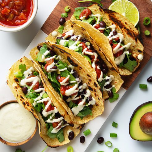 Vegan Black Bean Breakfast Tacos with Creamy Garlic Sauce | picklesnhoney.com #vegan #glutenfree #breakfast #tacos #recipe